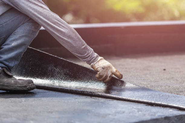 Professional Basement Waterproofing technician working in Smithville, OH